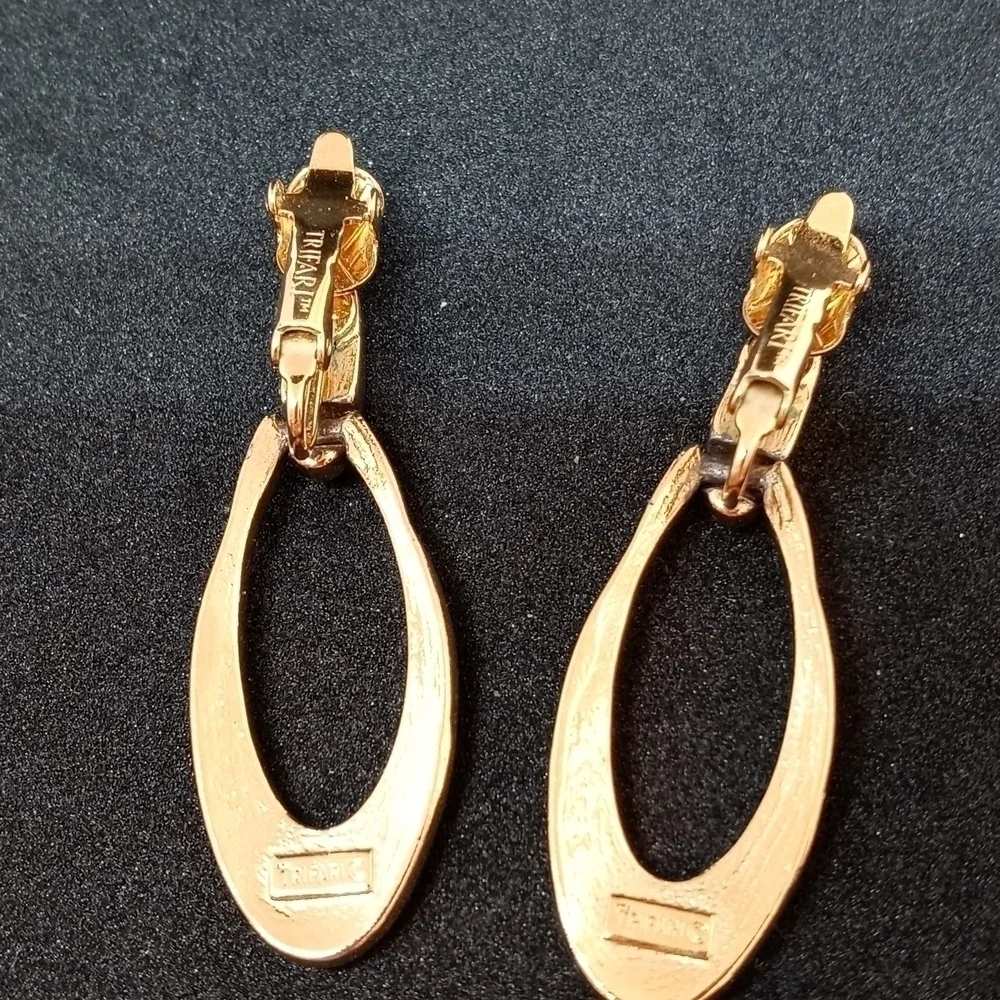 Trifari costume jewelry gold and black accent clip on earrings